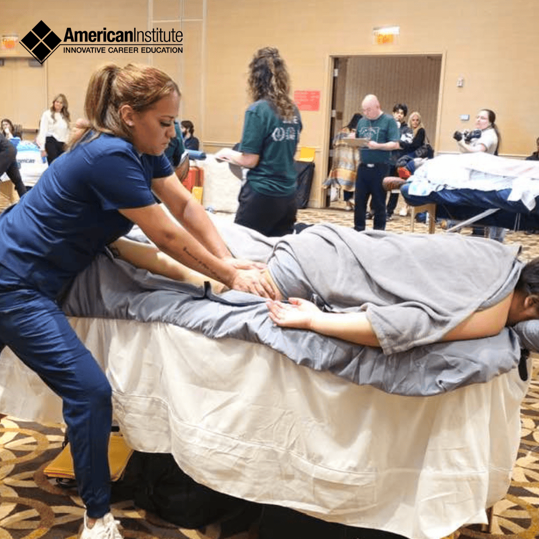 American Institute grad performing a massage during the NJ massage championship